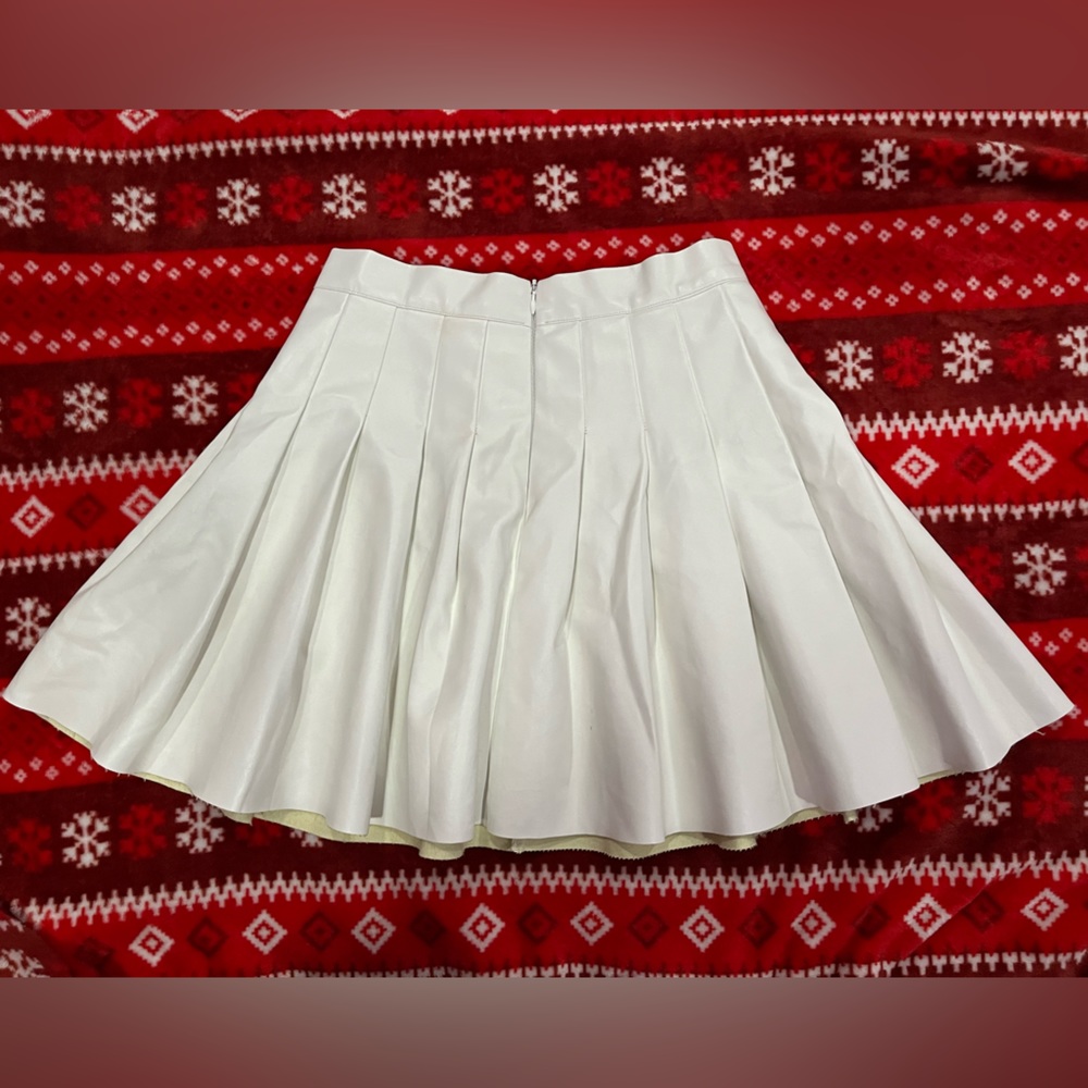 a white skirt size XS brand- shein used maybe twice really good condition